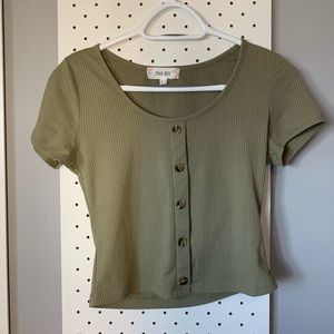 green tight fitting t shirt